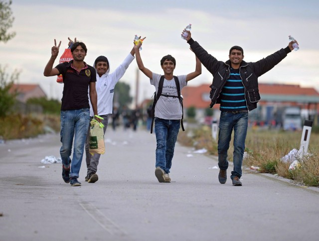 Refugees arrive in Austria after leaving Hungary