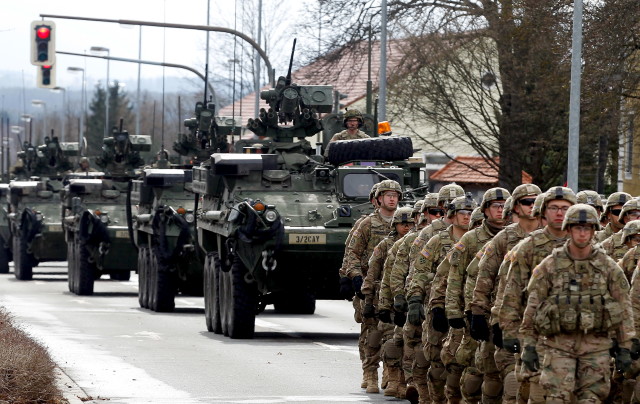 Soldiers of the U.S. Army 3rd squadron, 2nd Cavalry Regiment as the troops of the "Dragoon Ride" military exercise arrive at their home base at Rose Barracks in Vilseck