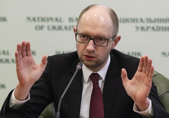 Ukraine's new Prime Minister Arseny Yatseniuk speaks during a news conference in Kiev