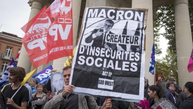 Demonstrators gather in front of the war