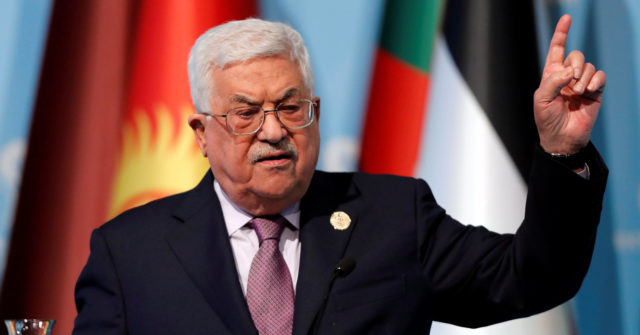 Palestinian President Abbas speaks during a news conference following the extraordinary meeting of the OIC in Istanbul